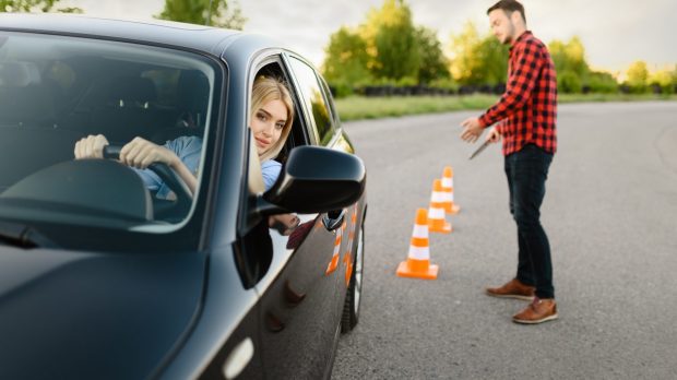 male-instructor-happy-with-driving-of-his-student-e1627375376155